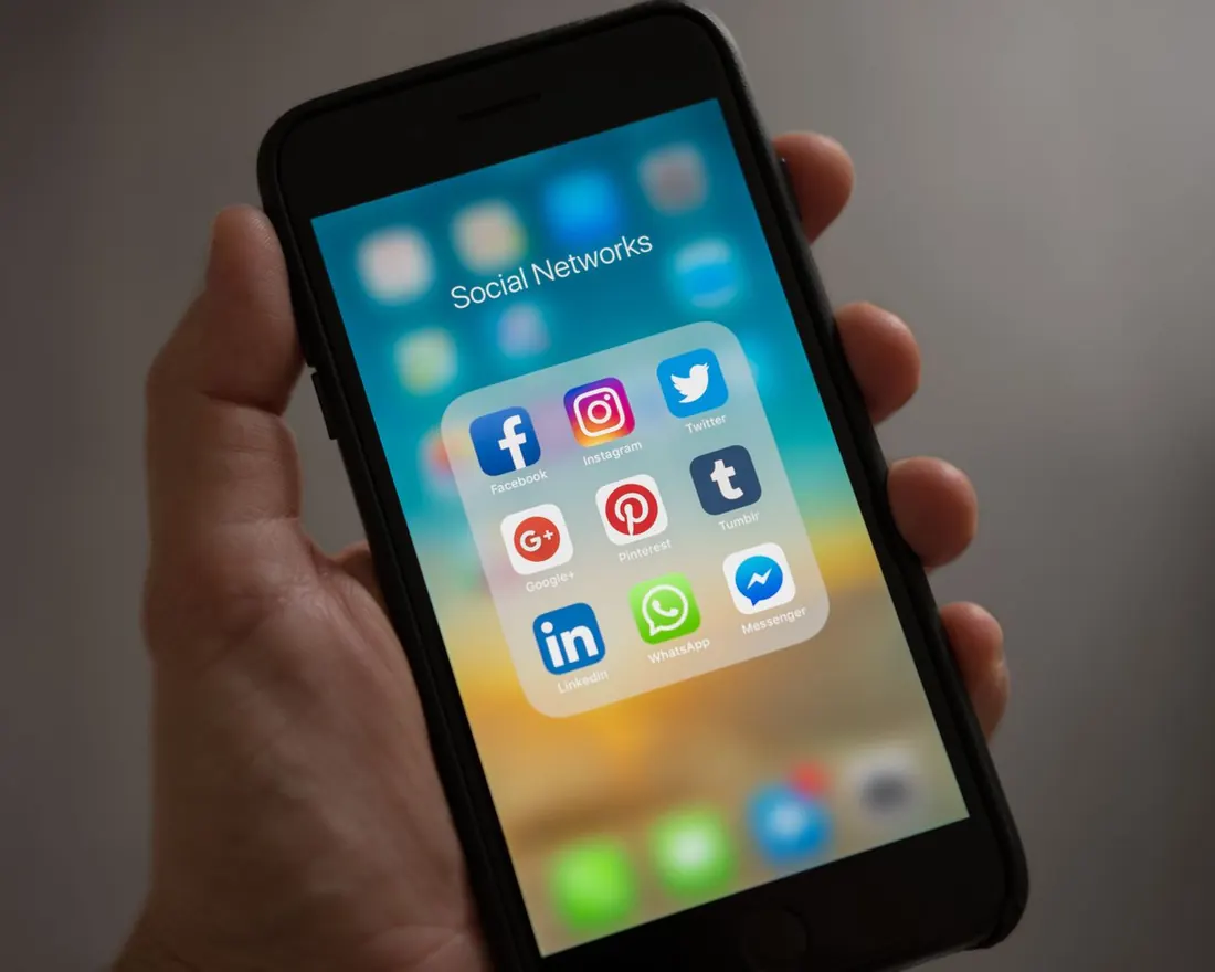 Phone showing Facebook, Instagram and other social media apps